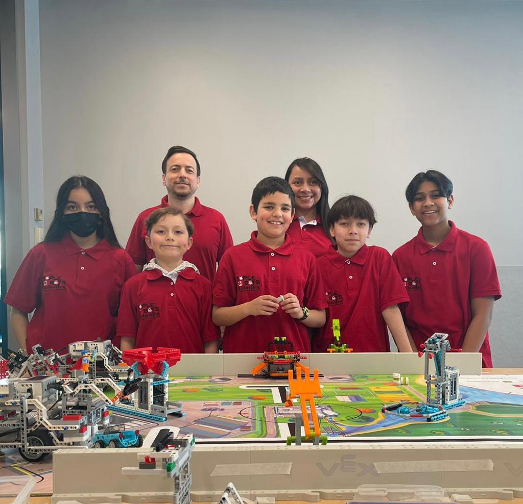 MAPLEBOTS ROBOTICS TEAM Maker Faire Yearbook Photo