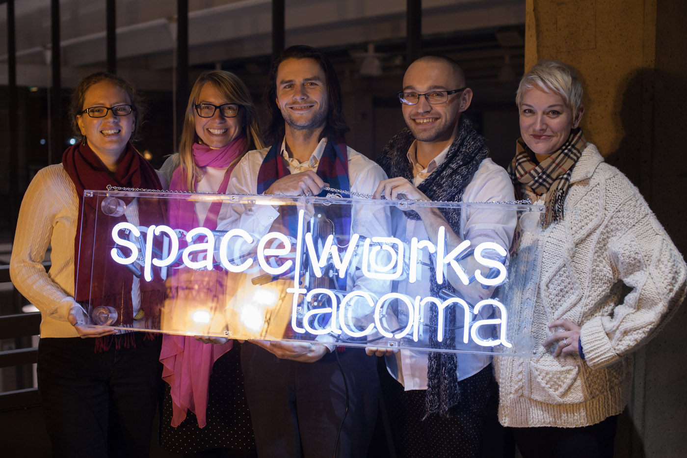 Kris Crews captured this luminous image of Spaceworks staff holding custom-made neon sign by local artist Galen Turner. Thanks to generous contributions from big organizations to small Tacoma businesses to individual donations, Spaceworks staff grew in 2016 to accommodate more clients and provide higher quality of services. Left to right: Gwen Kohl, Heather Joy, Gabriel Brown, Dmitry Mikheyev, & Kate Monthy.