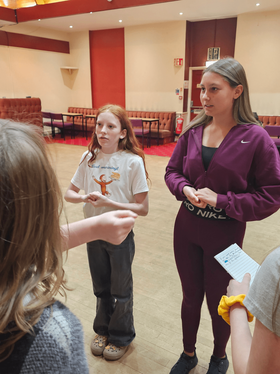 Assistant leading a small group activity at Stagepoint Studio