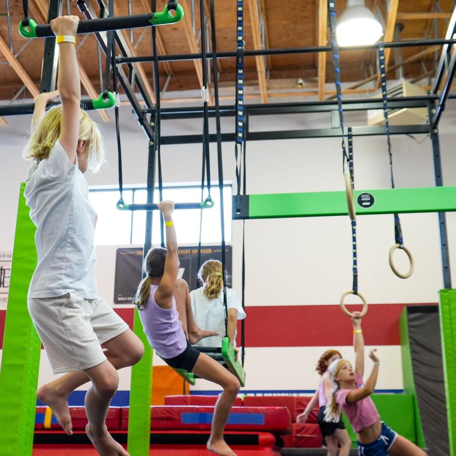 Kids playing on Bailey's Sports Open Play equipment