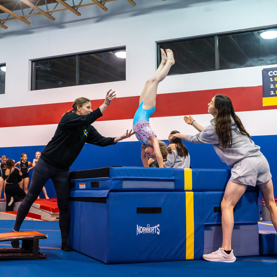 Pre-Team gymnast training at Bailey's Sports