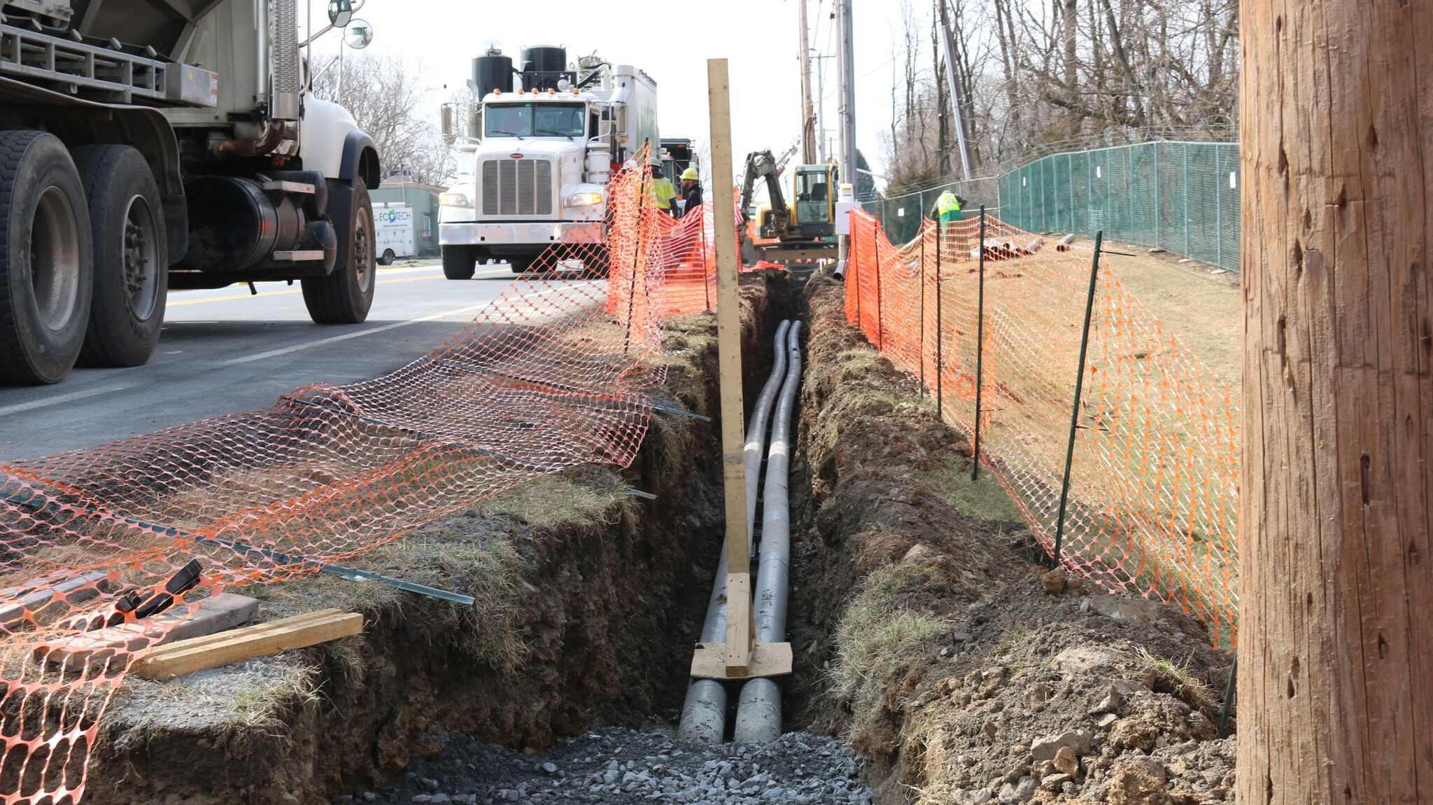Trenching along roadside to locate existing gas line to allow new electrical lines to be installed