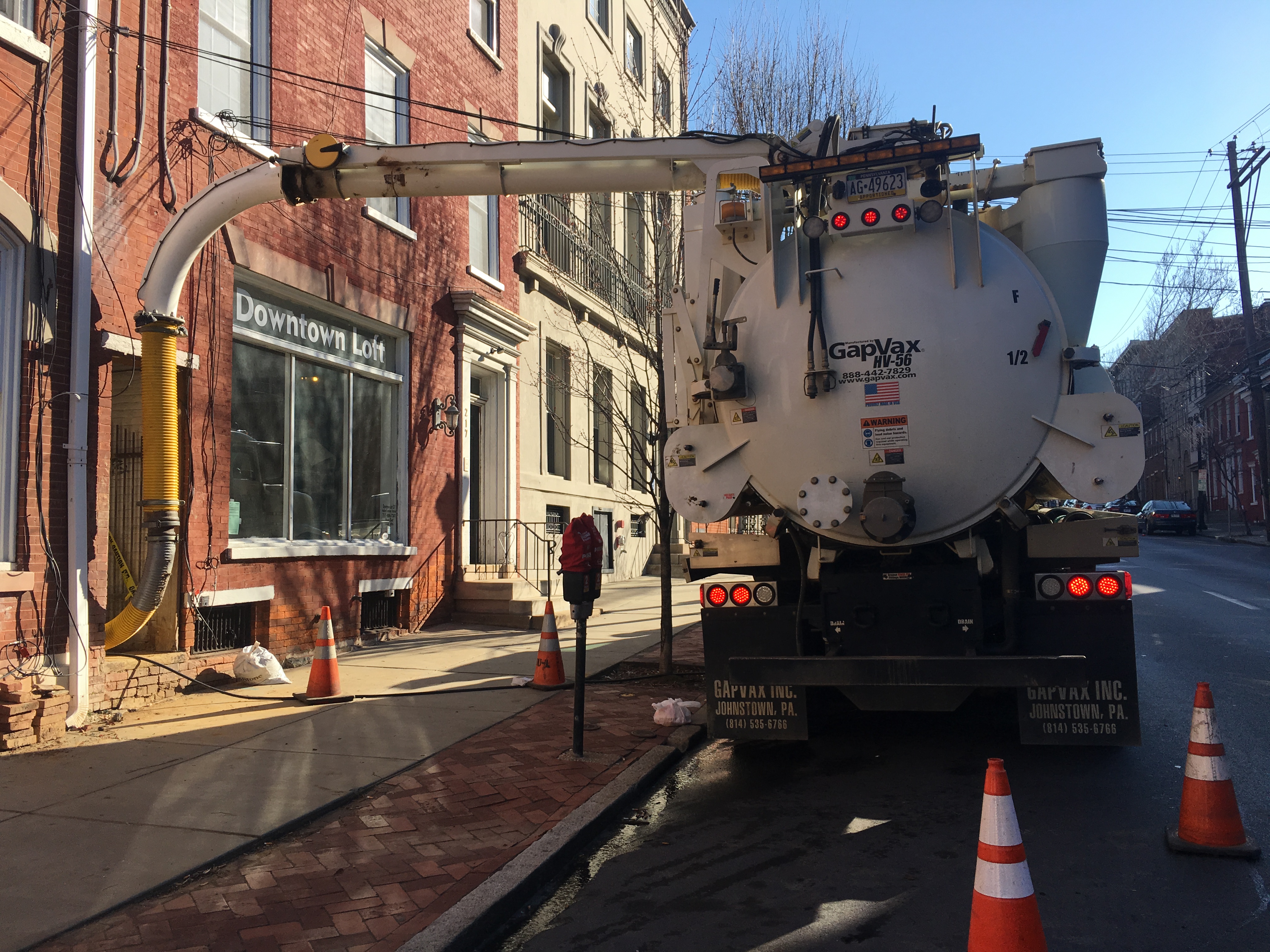 Hydro Excavating for rental property owners along with plumber to expose water main Remote excavation through alleyway from street side due to restricted access.