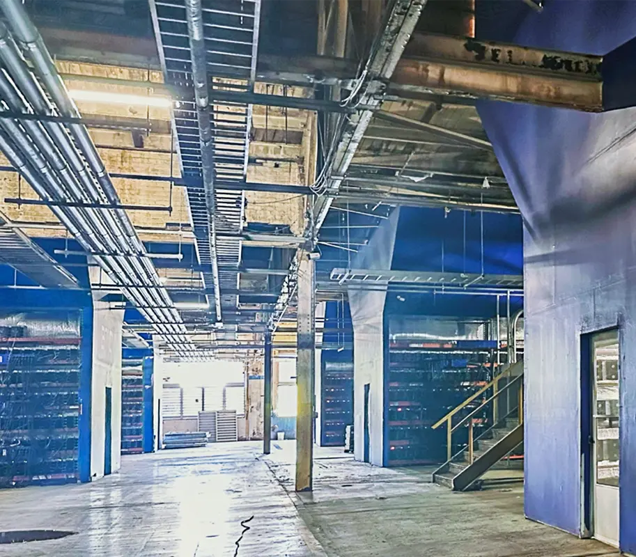 Interior view of a professional crypto mining facility with optimized ventilation