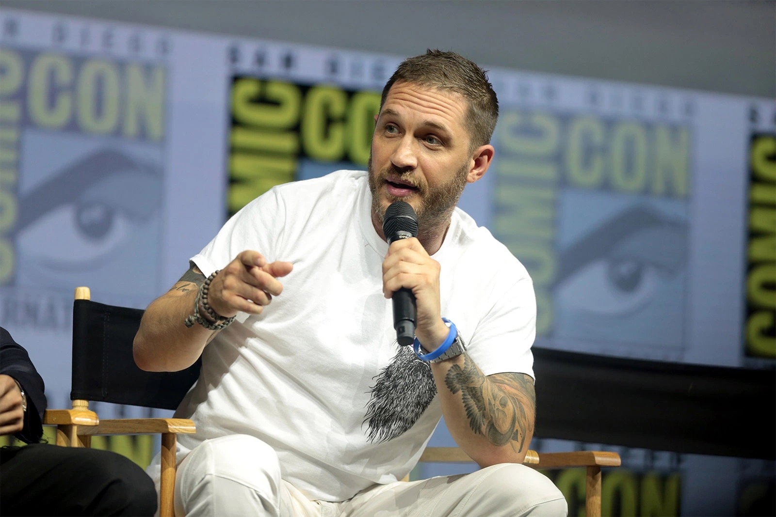 Tom Hardy answering questions during a Comic-Con panel.