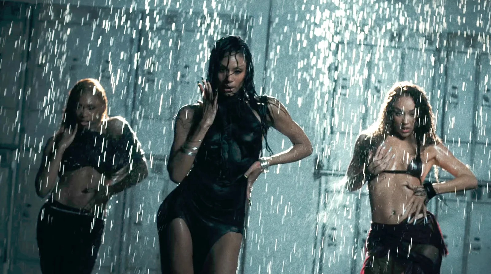 FLO in a rain sequence from their latest music video for "Cry Ugly."