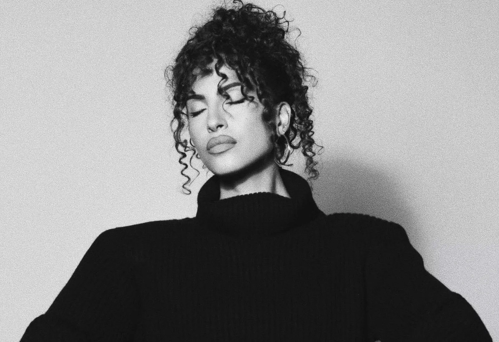 Snoh Aalegra in a black and white promotional photo for her new album.