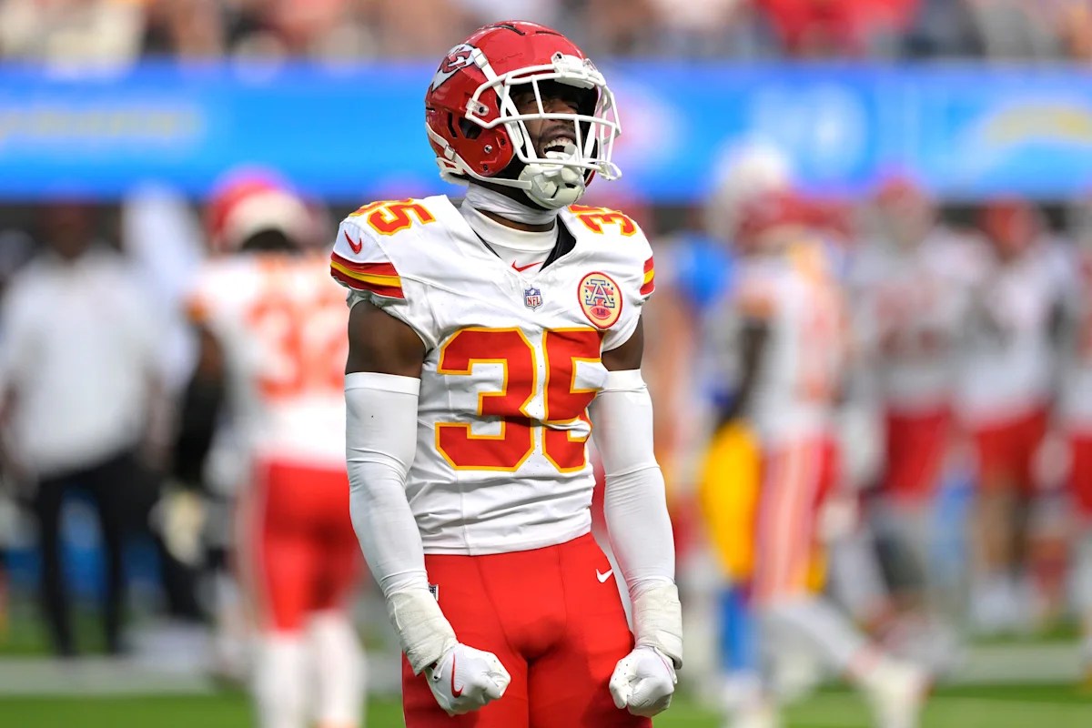 Sep 29, 2024; Inglewood, California, USA; Kansas City Chiefs cornerback Jaylen Watson (35) celebrates after breaking up a pass for Los Angeles Chargers wide receiver Joshua Palmer (5) in the second half at SoFi Stadium. Mandatory Credit: Jayne Kamin-Oncea-Imagn Images