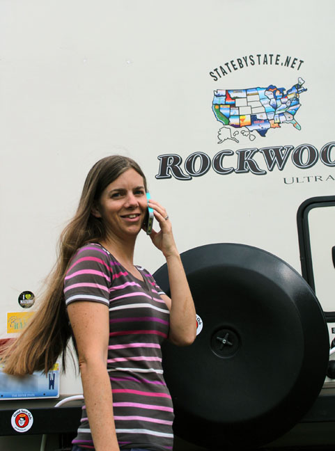 A woman on a phone, communication is important when you are traveling internationally.