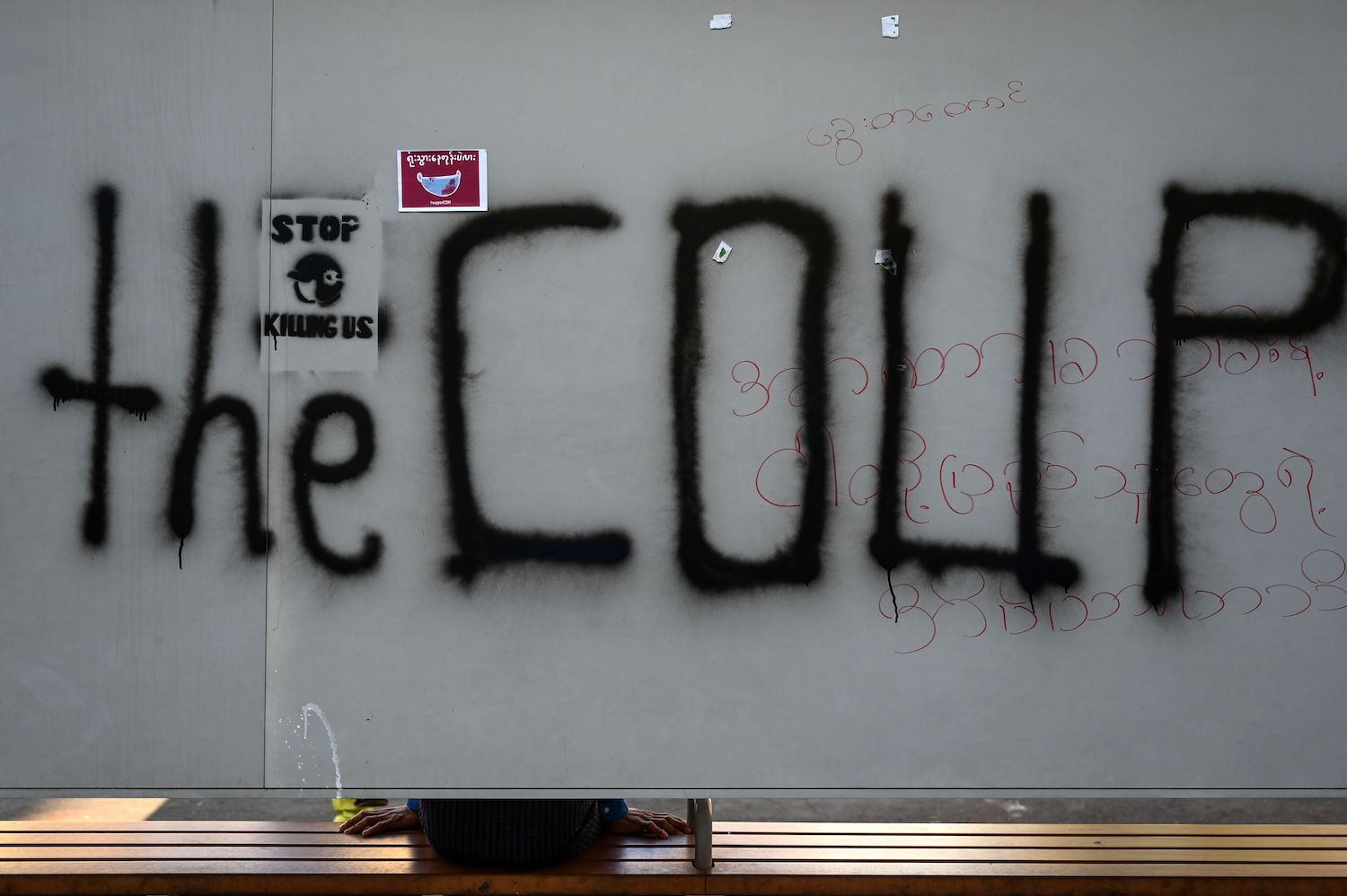 Protesters hold a banner in support of the national unity government (nug) as they take part in a demonstration against the military coup in . Don T Call It A Coup Myanmar Junta Warns