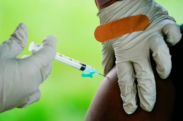 Covid vaccine australia: government approves 32 companies for workplace
