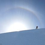 A halo of rainbows over skier