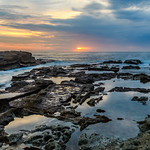 Sunrise Seascape and Rocky Headland