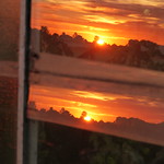 Sunset reflected in double glazing