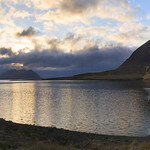 as night settles over mountains and lakes