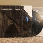 Crocodile God / The Corpse - Split CD