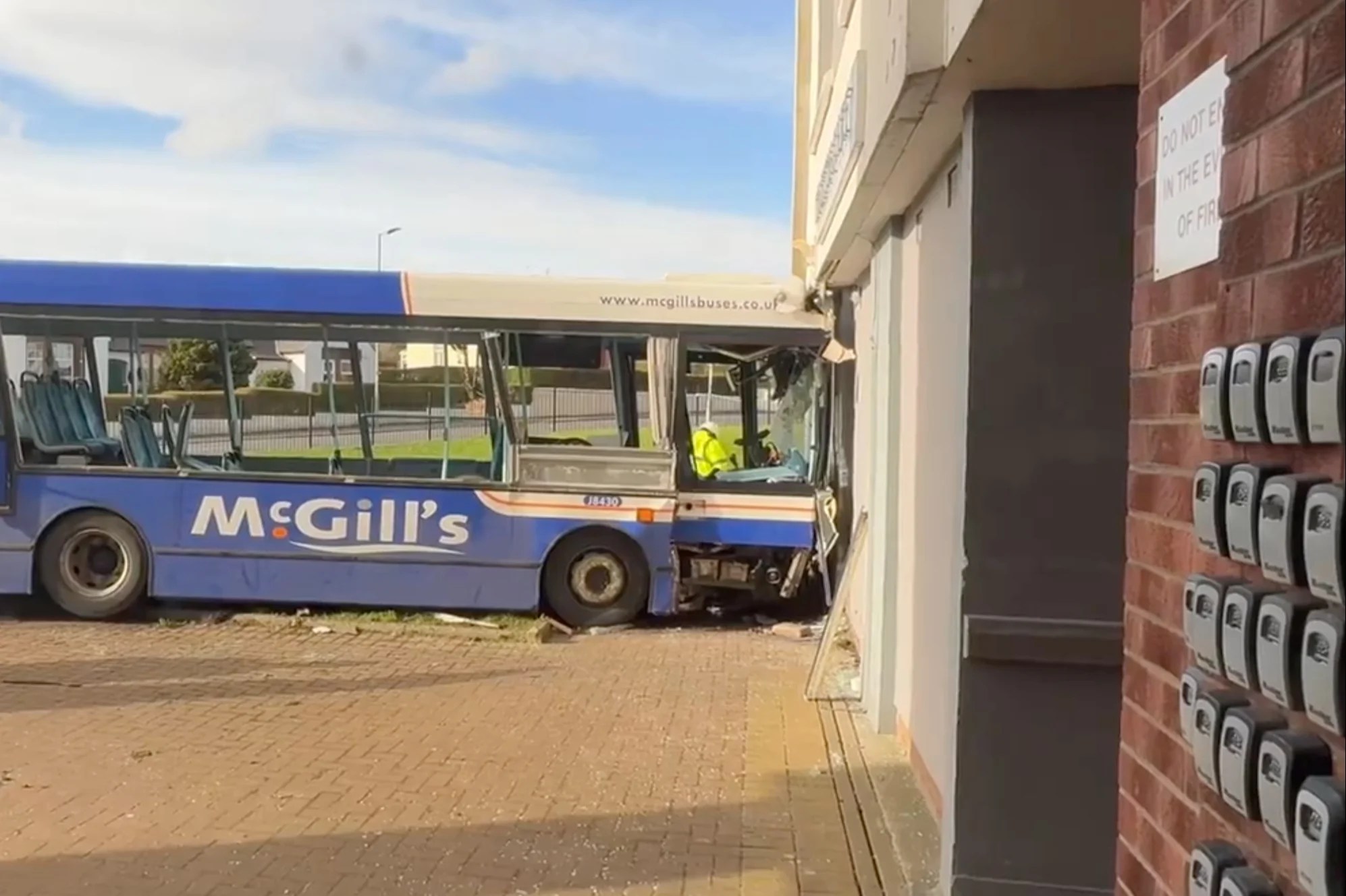Five people taken to hospital following bus collision with block of flats in Paisley