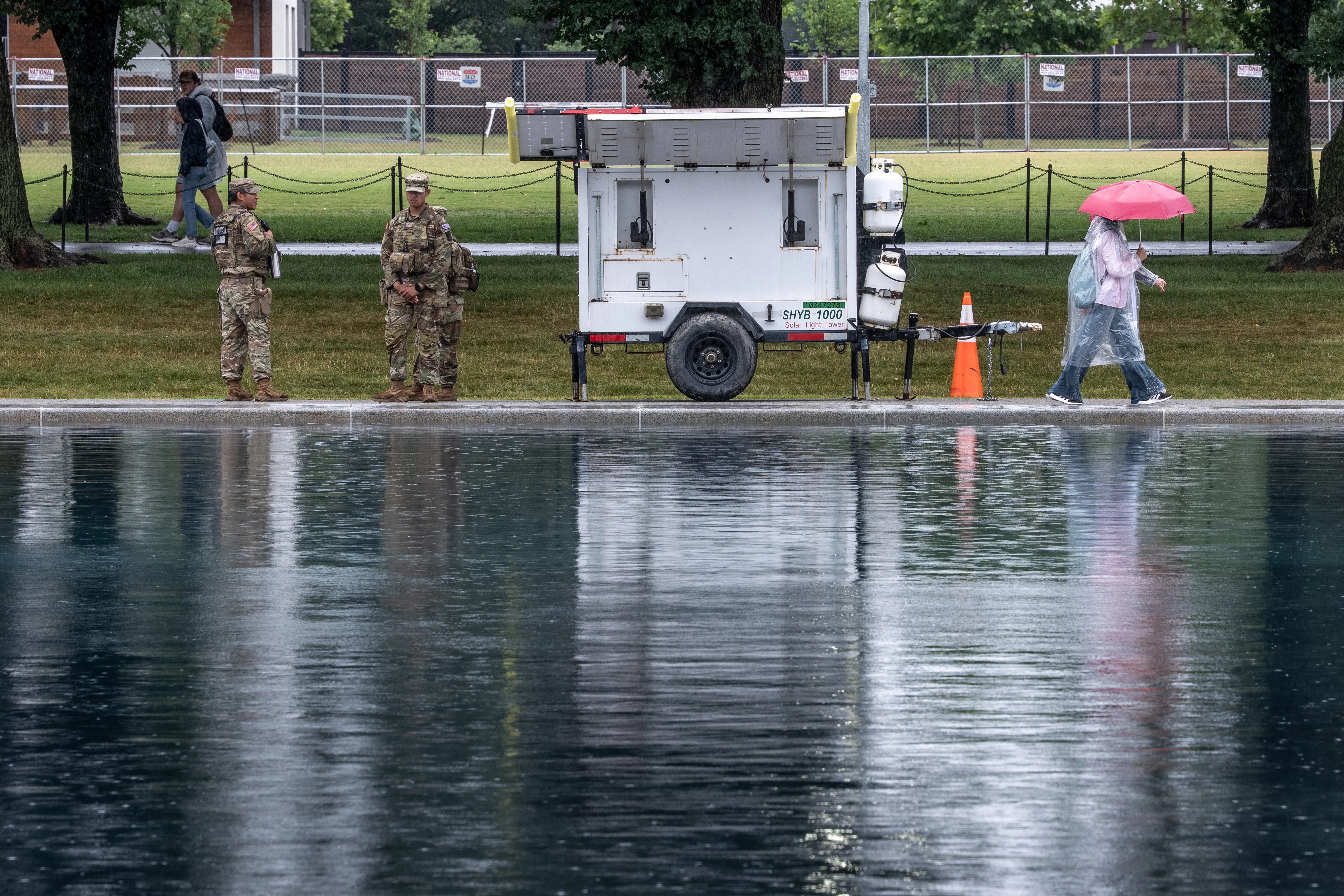 Trump's Reflecting Pool Renovation Chaos: Fences, Vandalism, and Delays (2026)