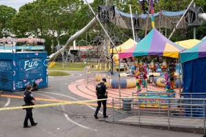 15-year-old in custody after Seattle food festival mass shooting that left three dead as police hunt second suspect