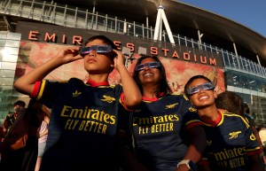 Best solar eclipse photos as sports fans enjoy historic event at stadiums across Europe
