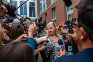 Woman in court charged with intimidating jurors in Lindsay Clancy case by allegedly filming them