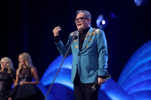 Alan Carr fights back tears after being honoured with surprise National Television Award