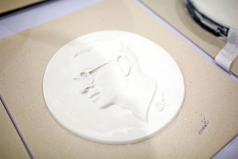 หล่อเหรียญ