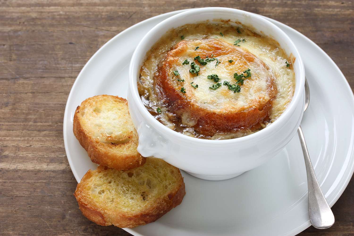 Top with toasted cheesy bread to finish.