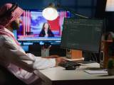 Qualified Arab Programmer Writing Code On Computer Screen While In