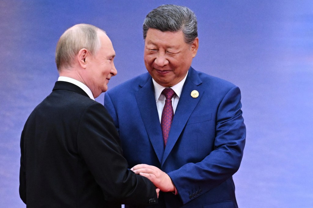 Putin Visits China to Reaffirm Russia Ties as Xi Also Seeks Stable US Relations After Trump Summit