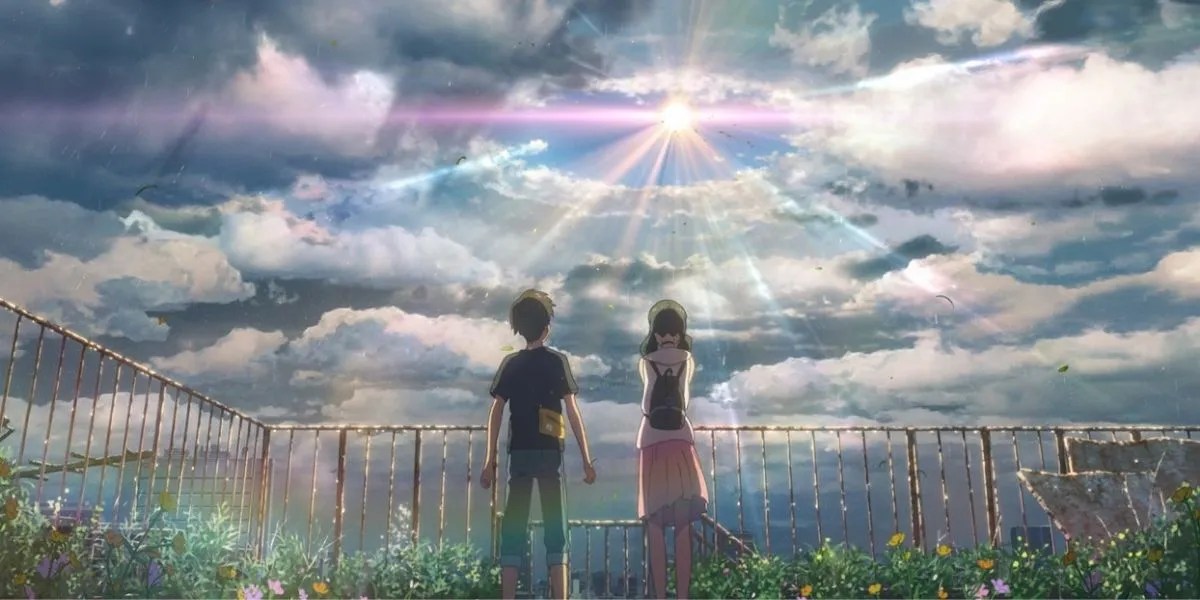 Meteando con ustedes dos personajes mirando un claro en el cielo con el sol estallando.