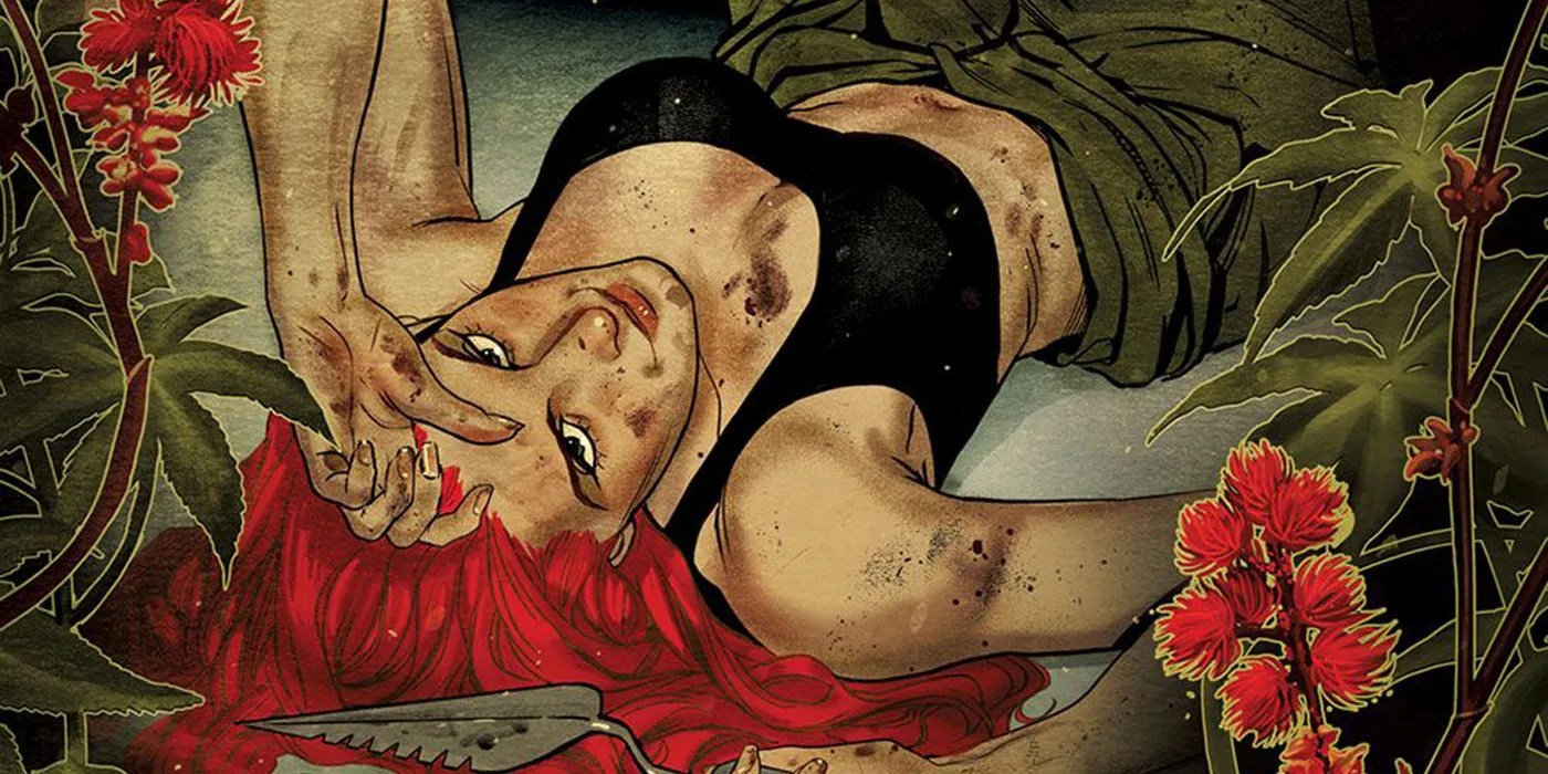 Poison Ivy lays down, surrounded by flowers.