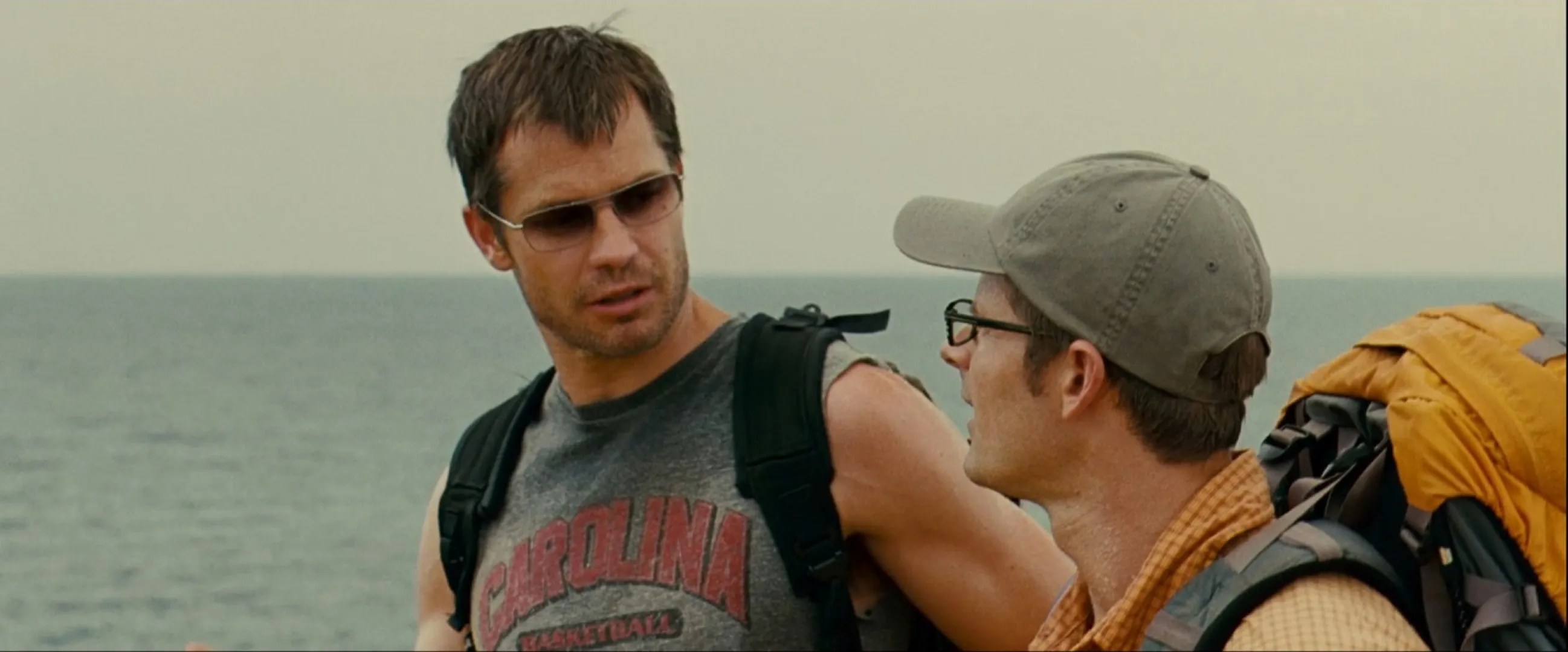 Timothy Olyphant chats with a vaguely uncomfortable Steve Zahn while backpacking in the thriller A Perfect Getaway