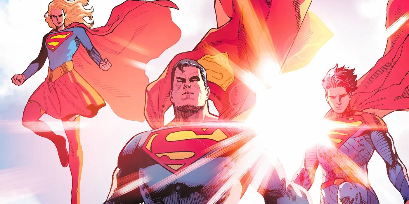 Supergirl, Superman, and Jonathan Kent descend with the sun at their backs.