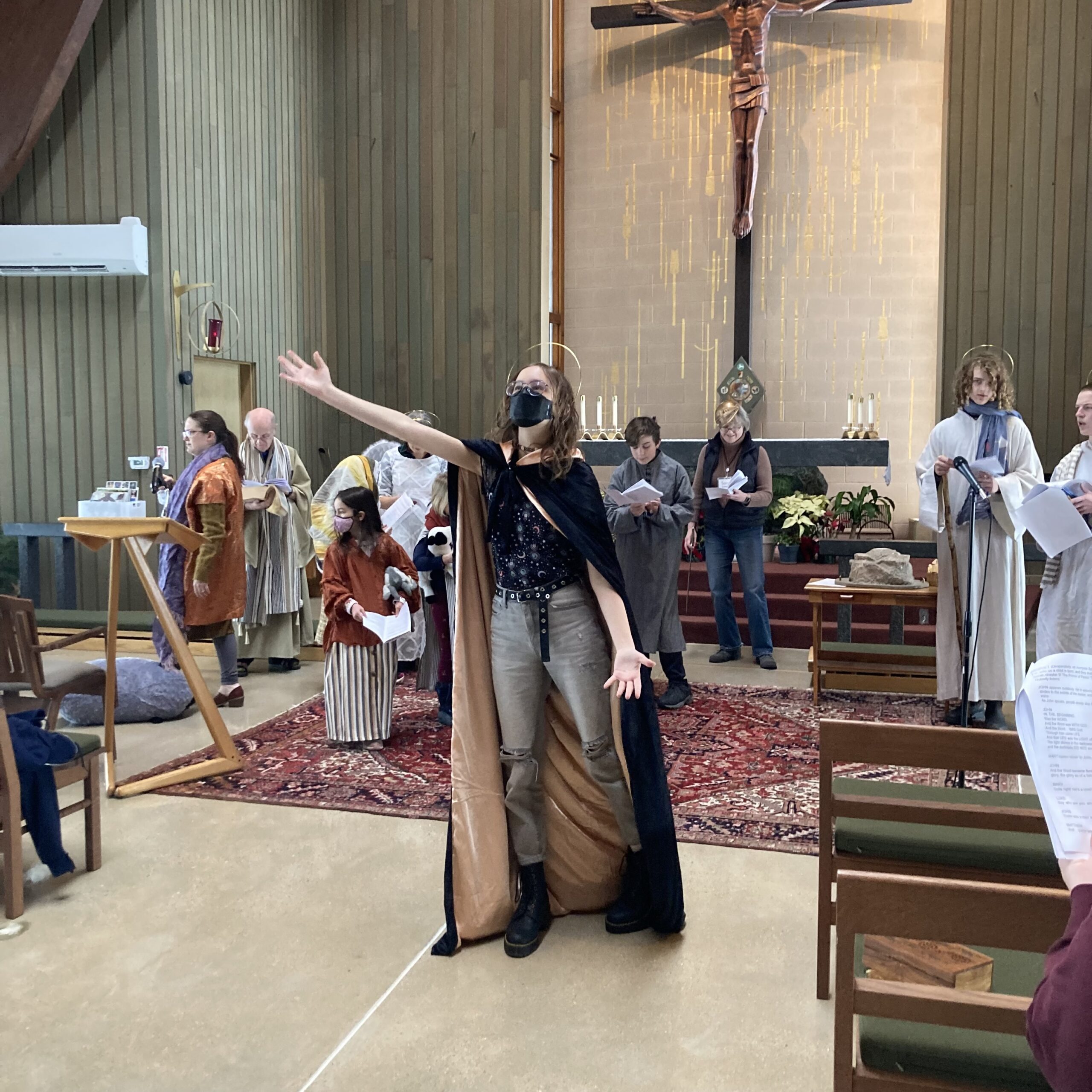 And then... a mysterious caped stranger arrives. His name is... John?