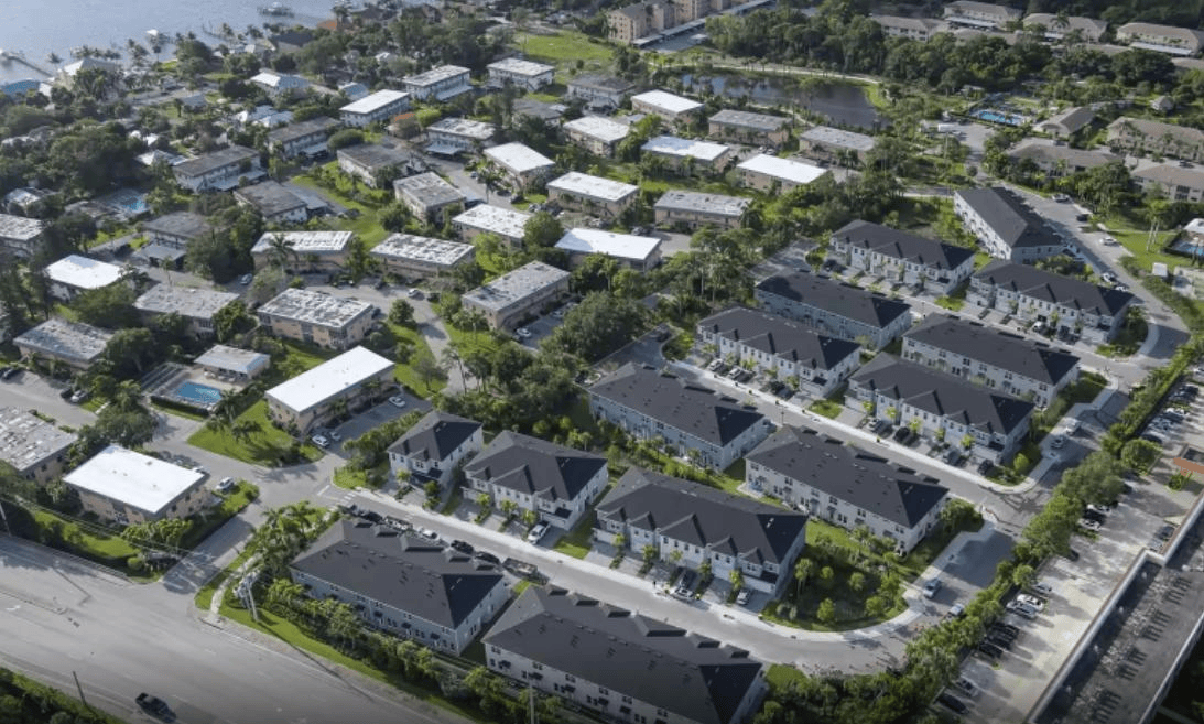 Aerial view of newly built townhome buildings at Ocean Cove in Stuart, Florida, near the waterfront