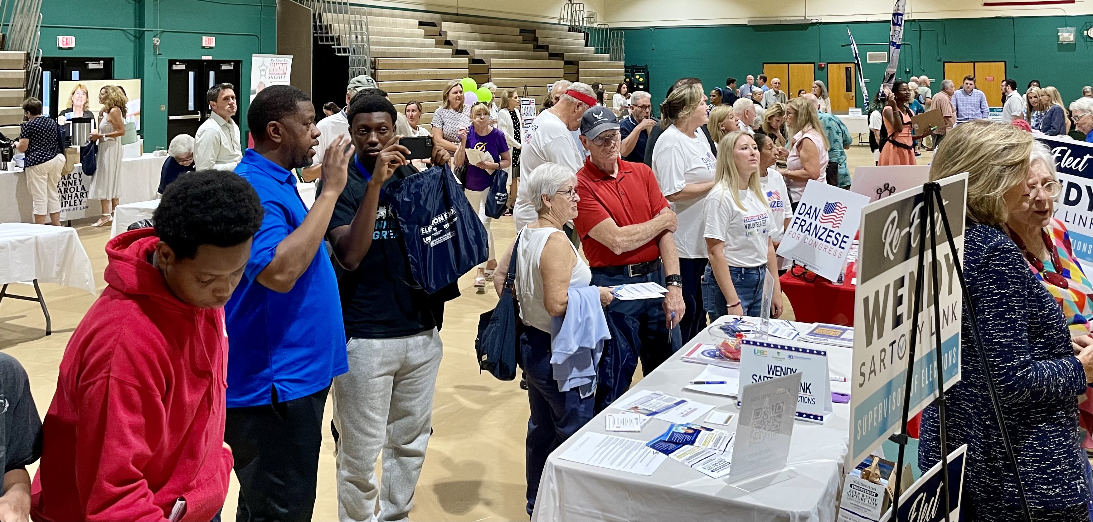 Voters gathering Monday at the League of Women Voters/Leadership Palm Beach County 2024 Election Expo at Palm Beach State College's Lake Worth campus.