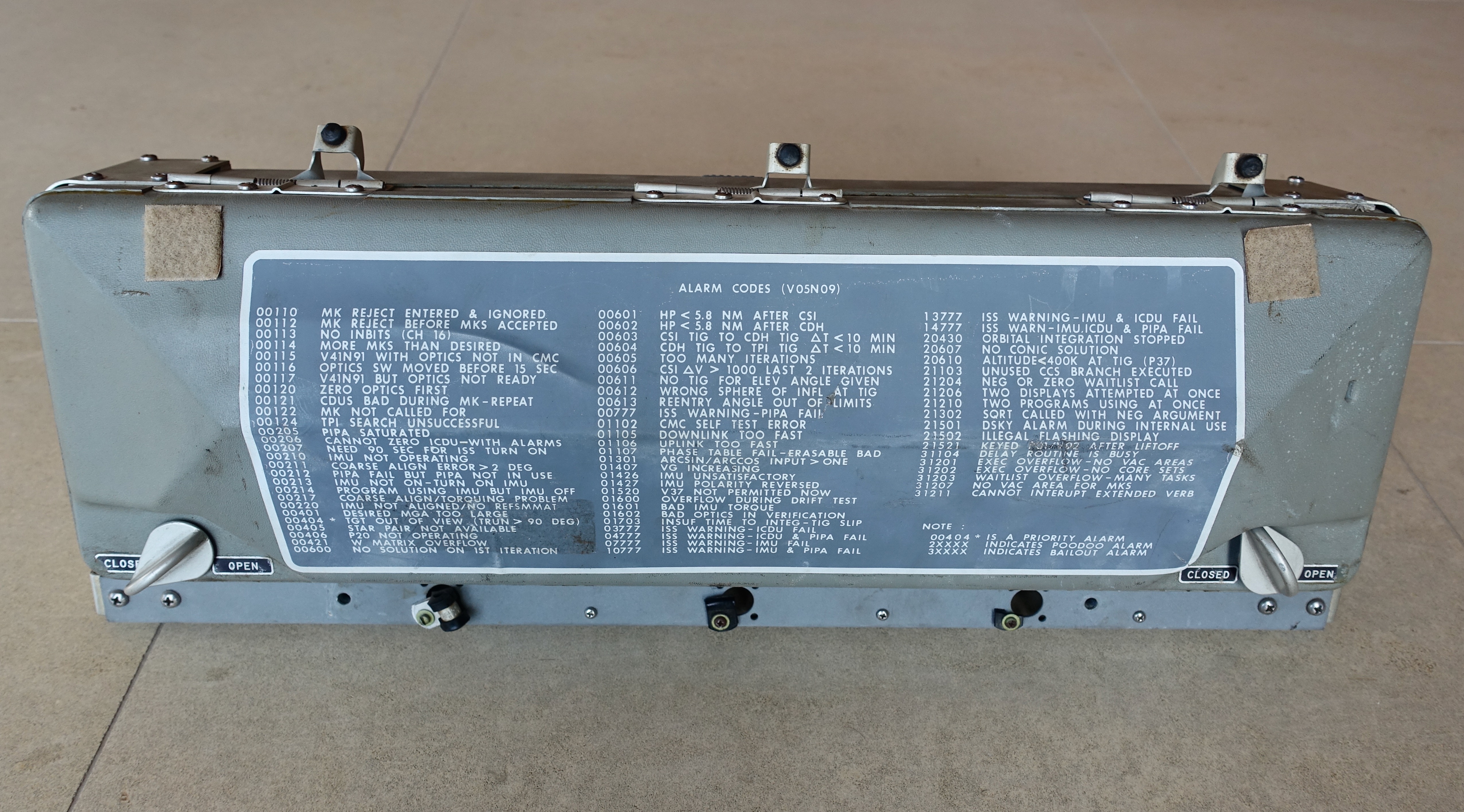 Apollo Command Module Computer Alarm Code Placard from the KSC Simulator