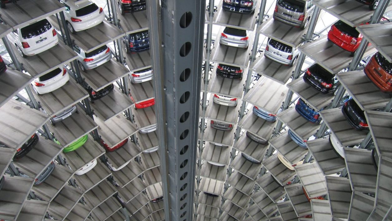 vehicles parked inside elevated parking lot