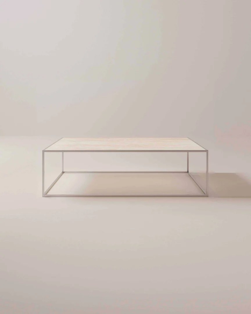 De TRIO Tafellamp Joost II is een moderne tafellamp met een geborstelde metalen voet en steel, voorzien van een ronde witte matglazen kap, afgebeeld verlicht op een witte achtergrond.