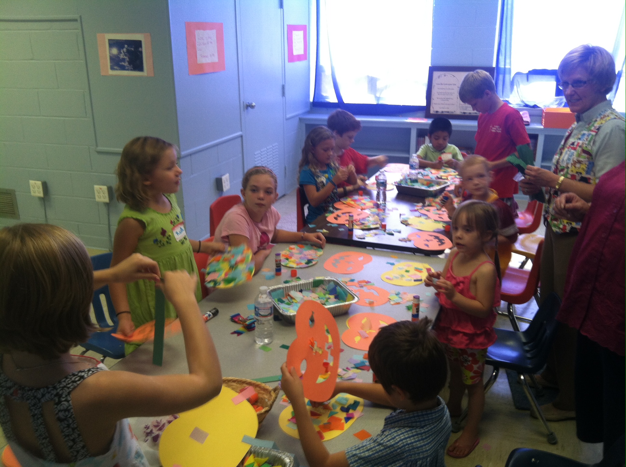 The Rev. Carol Kniesley leads crafts for the children