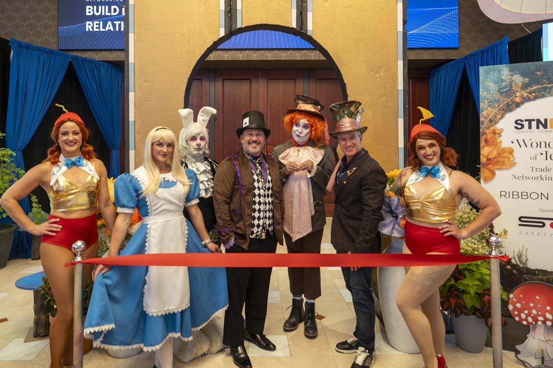 Alice in Wonderland actors pose at STN Expo.