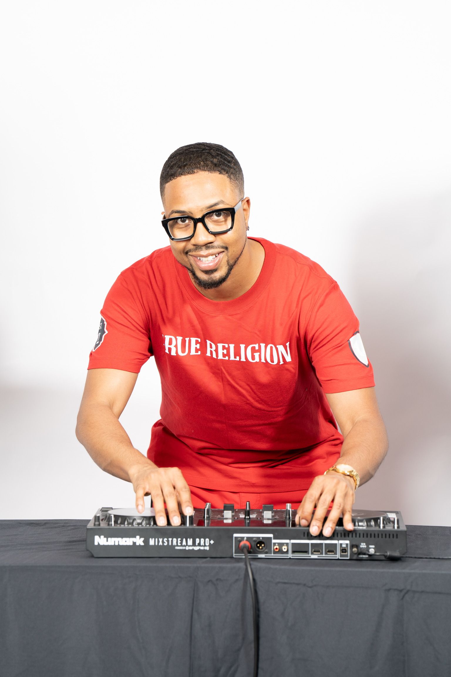 DJ Don Wan at a DJ controller