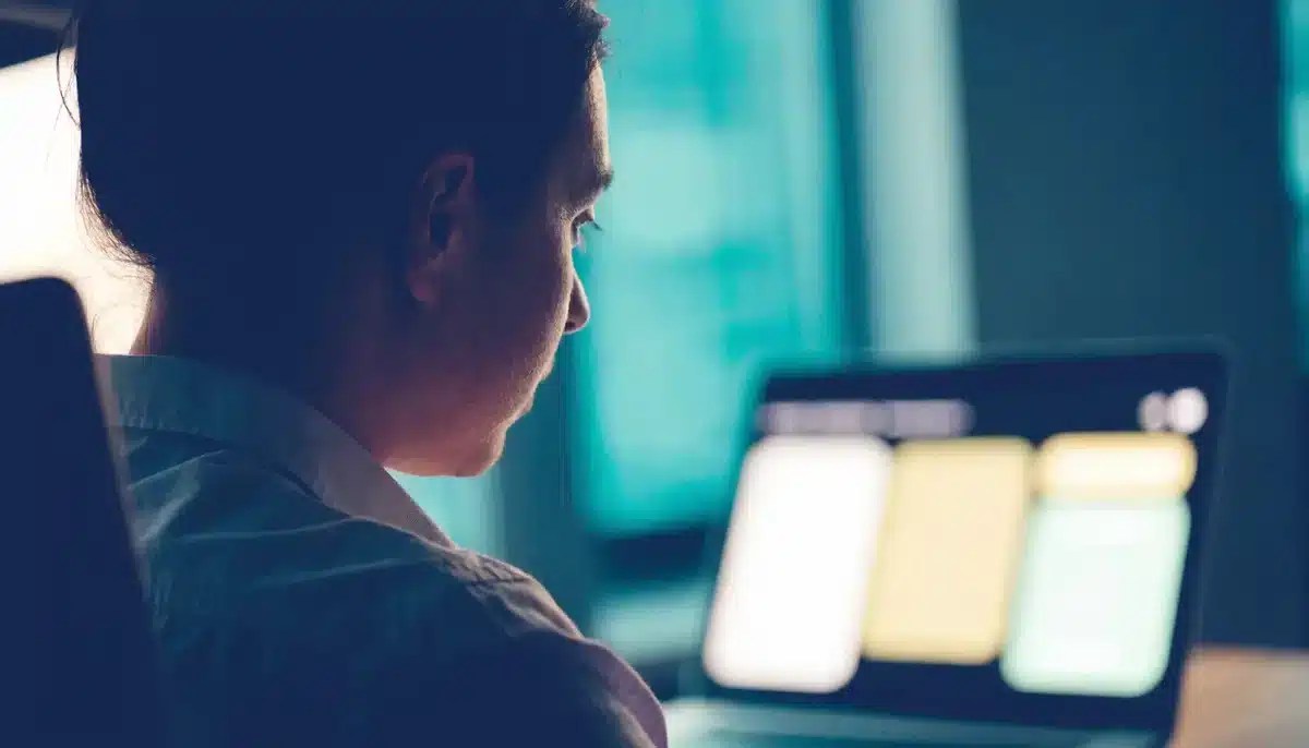 Marketing strategist reviewing AI-generated search answers while planning a generative engine optimization strategy