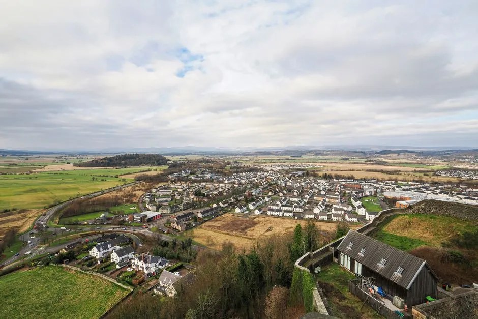 Aerial view of Scottish countryside representing the Lockerbie setting