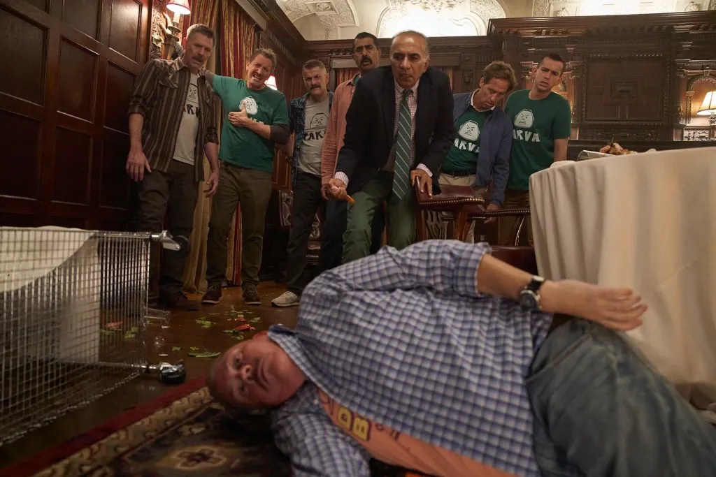 From L to R: Erik Stolhanske, Paul Soter, Steve Lemme, Jay Chandrasekhar, Iqbal Theba, Nat Faxon, Andrew Dismukes, Kevin Heffernan (on the floor) in Super Troopers 3 (2026).