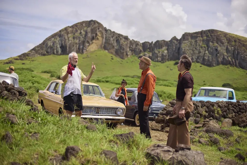 Director Martin McDonagh works with John Malkovich and Sam Rockwell on the set of Wild Horse Nine (2026).