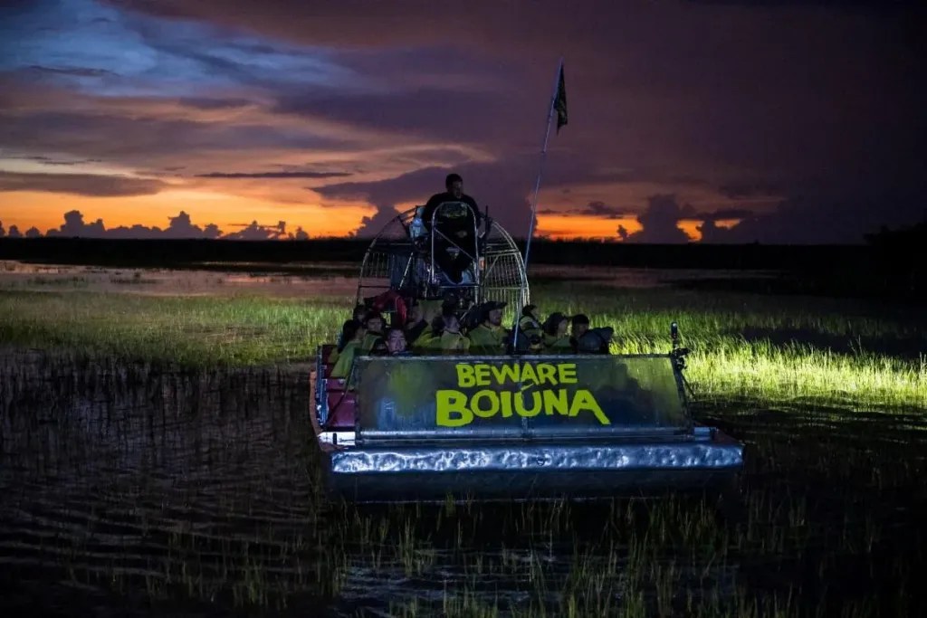 Influencers on a boat at the "Beware Bouina" x Swamp Tour Experience at Coopertown The Original Airboat Tour of Everglades National Park on September 01, 2026 in Miami, Florida.