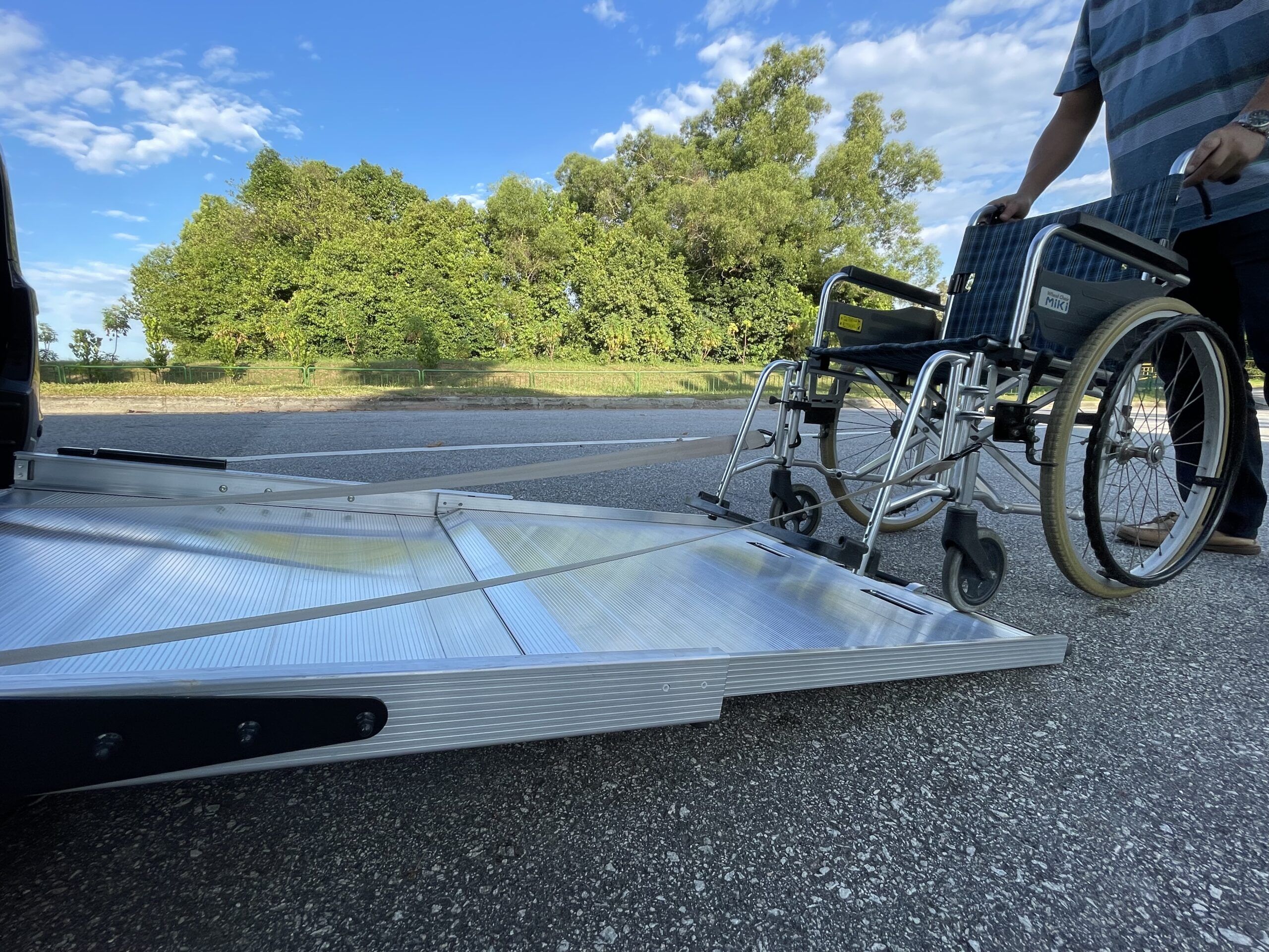 low angle of wheelchair going up the ramp