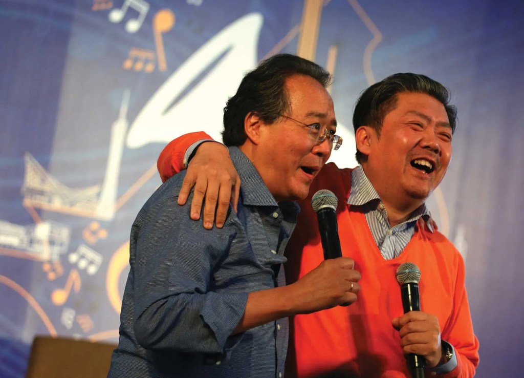 Yo-Yo Ma and Long Yu speak during a YMCG panel discussion
